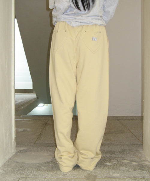 Back heart stitch pocket sweat jogger pants cream yellow