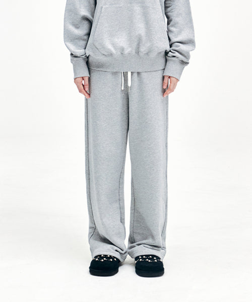 YOUHEE SYMBOL JERSEY TROUSER MELANGE GREY