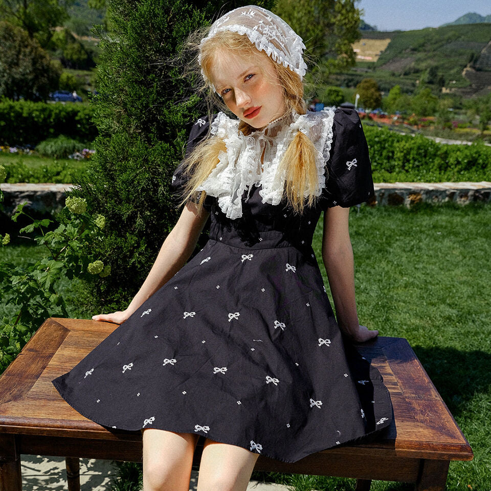 That's little ribbon mini black dress.