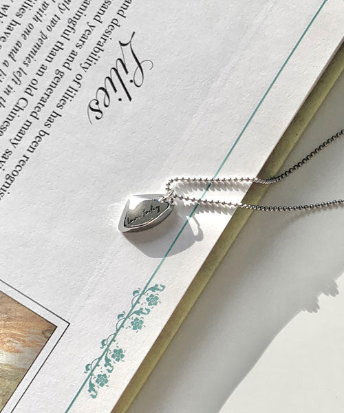 a cobbled trapezoidal steel necklace